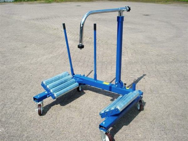 Hydraulic Wheel Changer for safely changing tires on farm equipment. Sold in Canada by Zuidervaart Agri-Import Ltd.